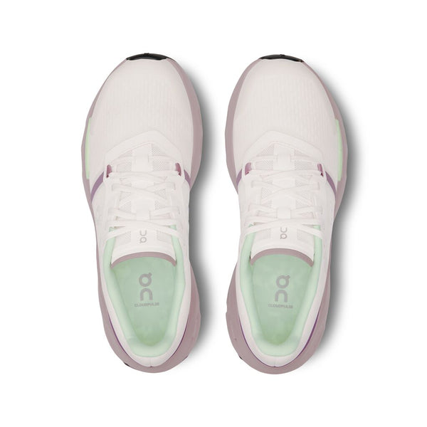 A top down look at a pair of on women's gym shoes.