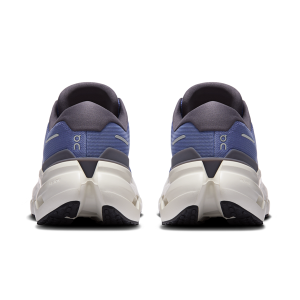 Pair of running shoes shown from the back on a white background