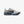 Grey, green, and blue running shoe on a white background