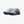 Grey, green, and blue running shoe on a white background