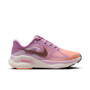 Pink and orange running shoe with Nike logo on a white background