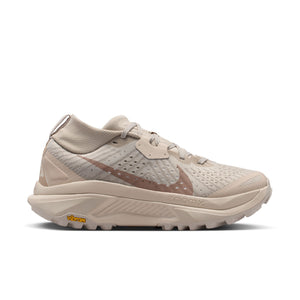 Beige running shoe on a white background