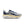 Gray and blue running shoe with 'ZoomX' on a white background