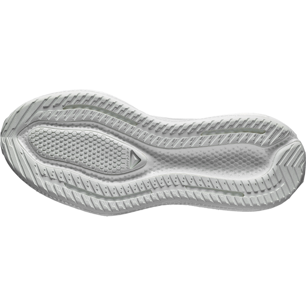 White, lime green, and black running shoe on a white background