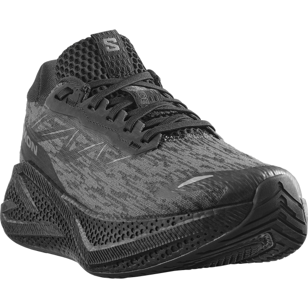 All black running shoe on a white background