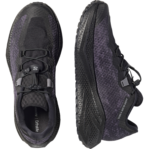 All black gravel running shoe on a white background