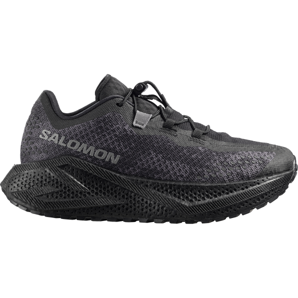 All black gravel running shoe on a white background