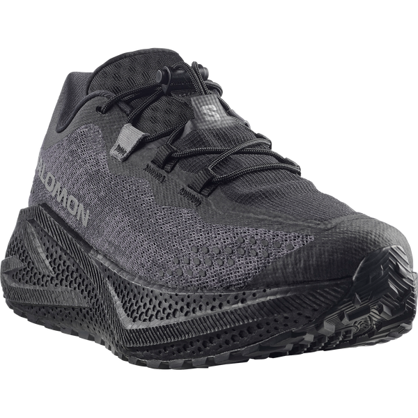 All black gravel running shoe on a white background