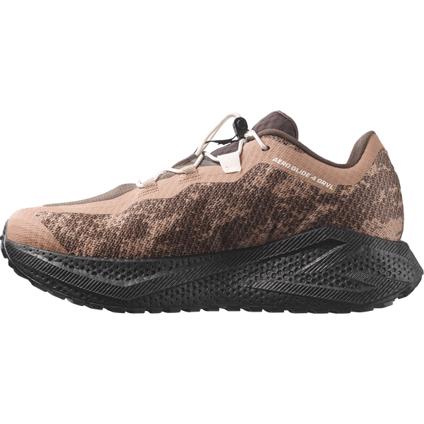Brown and black gravel running shoe on a white background