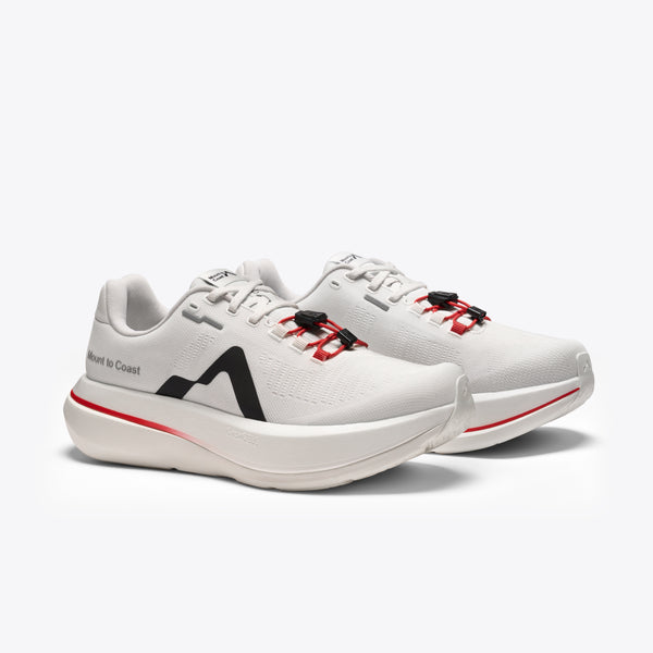 White running shoe with red and black accents on a white background