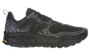 A pair of black New Balance Fresh Foam X Hierro V8 sneakers with a mesh upper and a thick white sole.