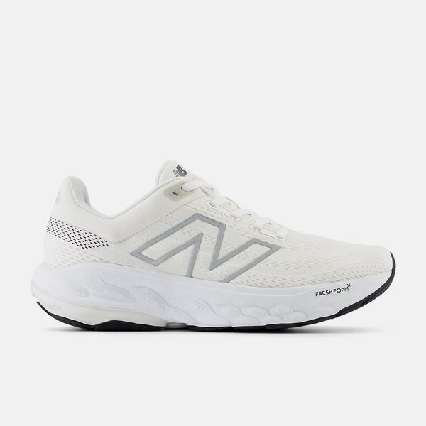 White running shoe with gray accents on a white background
