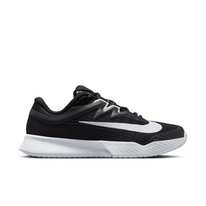 This Tennis shoe from Nike has a large white swoosh on the lateral side of the shoe.