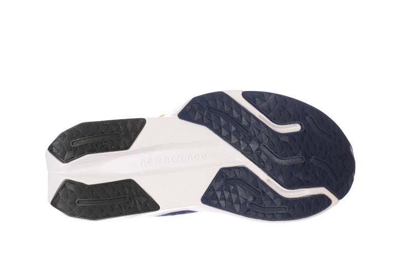 The outsole of the NB Kid's Propel V5 has a angular look through the heel and forefoot