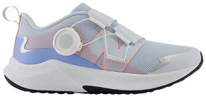 Pink and blue kids running shoe