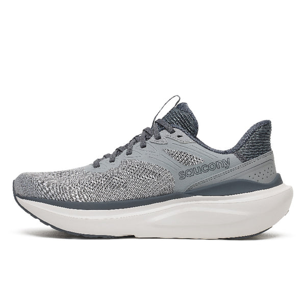 A pair of gray and white running shoes with a textured knit upper, dark gray laces, and a thick white midsole, shown against a plain white background.