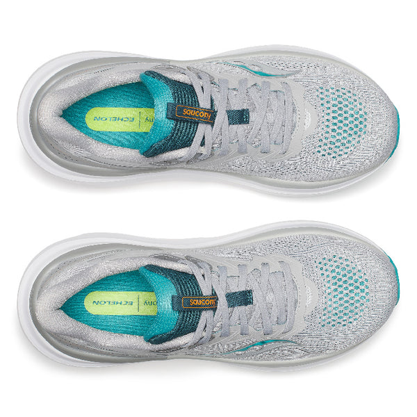 A light gray Saucony running shoe with a thick white midsole and teal accents on the logo, collar lining, and outsole, shown on a white background.