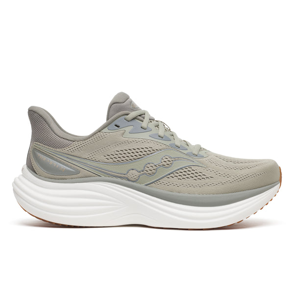 Gray and green Sauconyrunning shoe on a white background