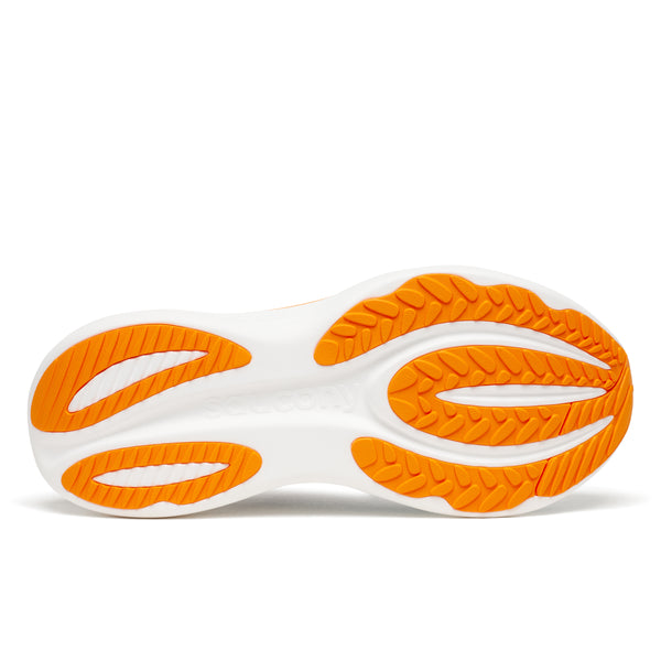 White shoe with orange sole on a white background