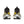 Black and yellow athletic shoes on a white background