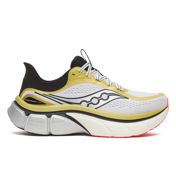 Saucony running shoe with yellow and black design on a white background