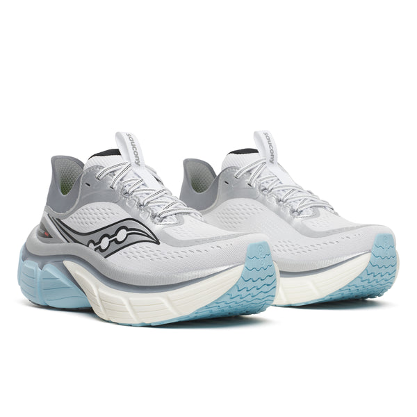 White running shoes with blue soles on a white background