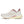 White running shoe with red accents on a white background