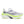 Neon yellow, white, and black running shoe on a white background