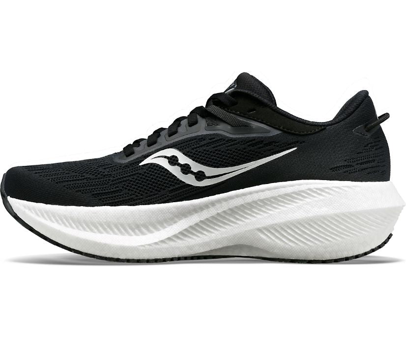 Medial view of the Women's Triumph 21 by Saucony in the wide D width, color Black/White