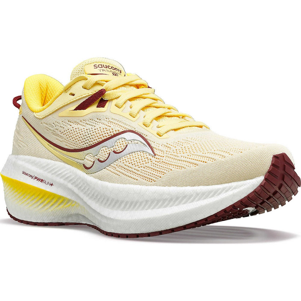 The uper of the Triuph 21 is a light yellow and the laces are a bit bolder