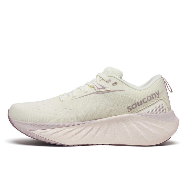 The medial side of these running shoes have the name Saucony written at an angle near the heel.