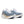 Pair of blue and beige running shoes on a white background