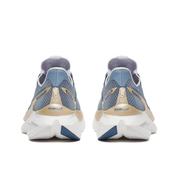 Pair of running shoes with a focus on the sole design on a white background