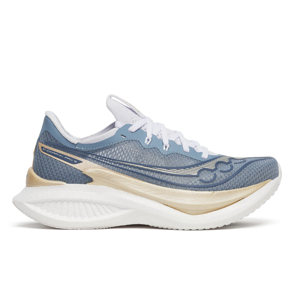 Blue and beige women's Saucony running shoe on a white background.