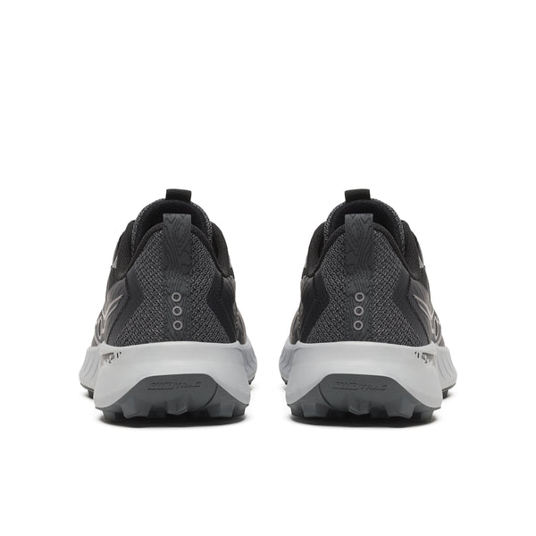 Black and gray athletic shoes on a white background