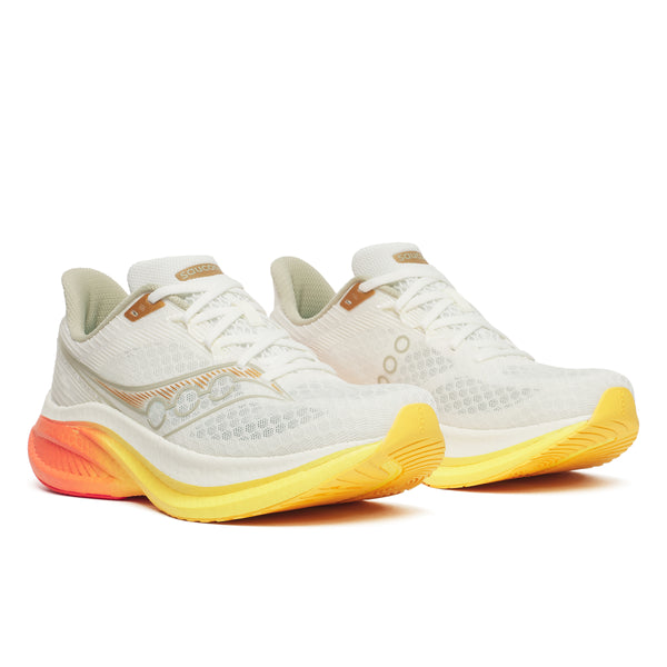 White running shoes with yellow soles on a white background
