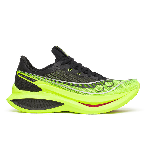 Black and neon green Saucony carbon plated running shoe on a white background