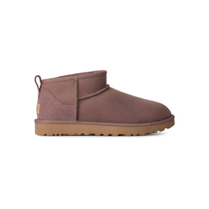 Mauve ankle length slipper boot on a white background