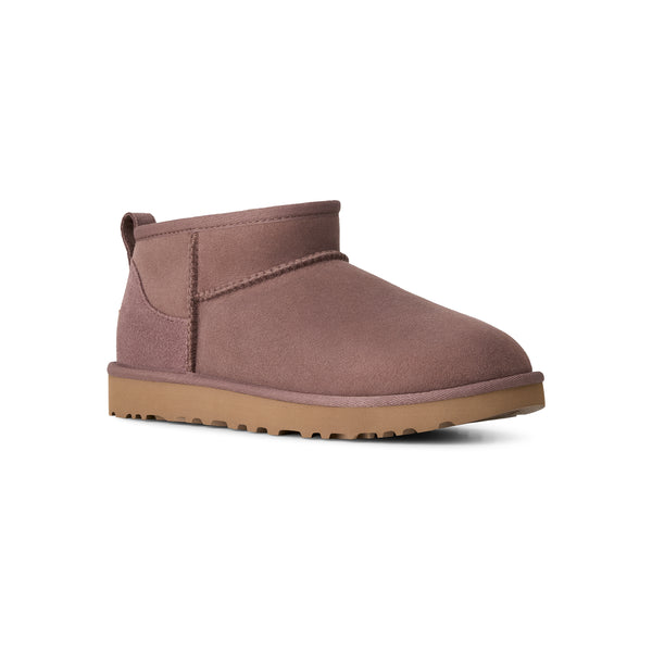 Mauve ankle length slipper boot on a white background