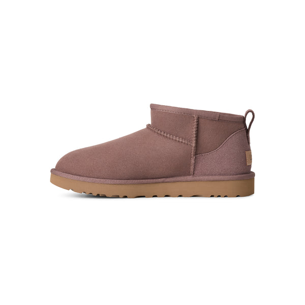 Mauve ankle length slipper boot on a white background