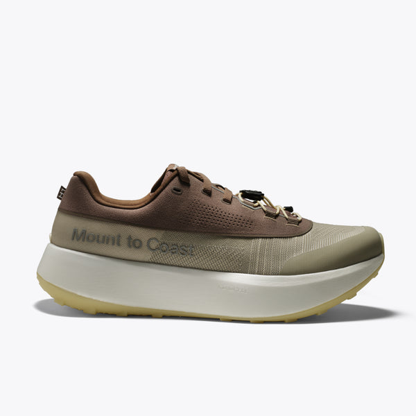 Mount to Coast featuring a brown and olive green upper, a thick cream-colored platform midsole, and a light tan outsole.