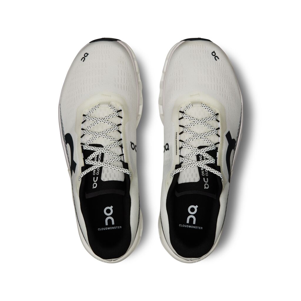 The laces of the Men's Cloudmonster 3 are mostly white with some black specks