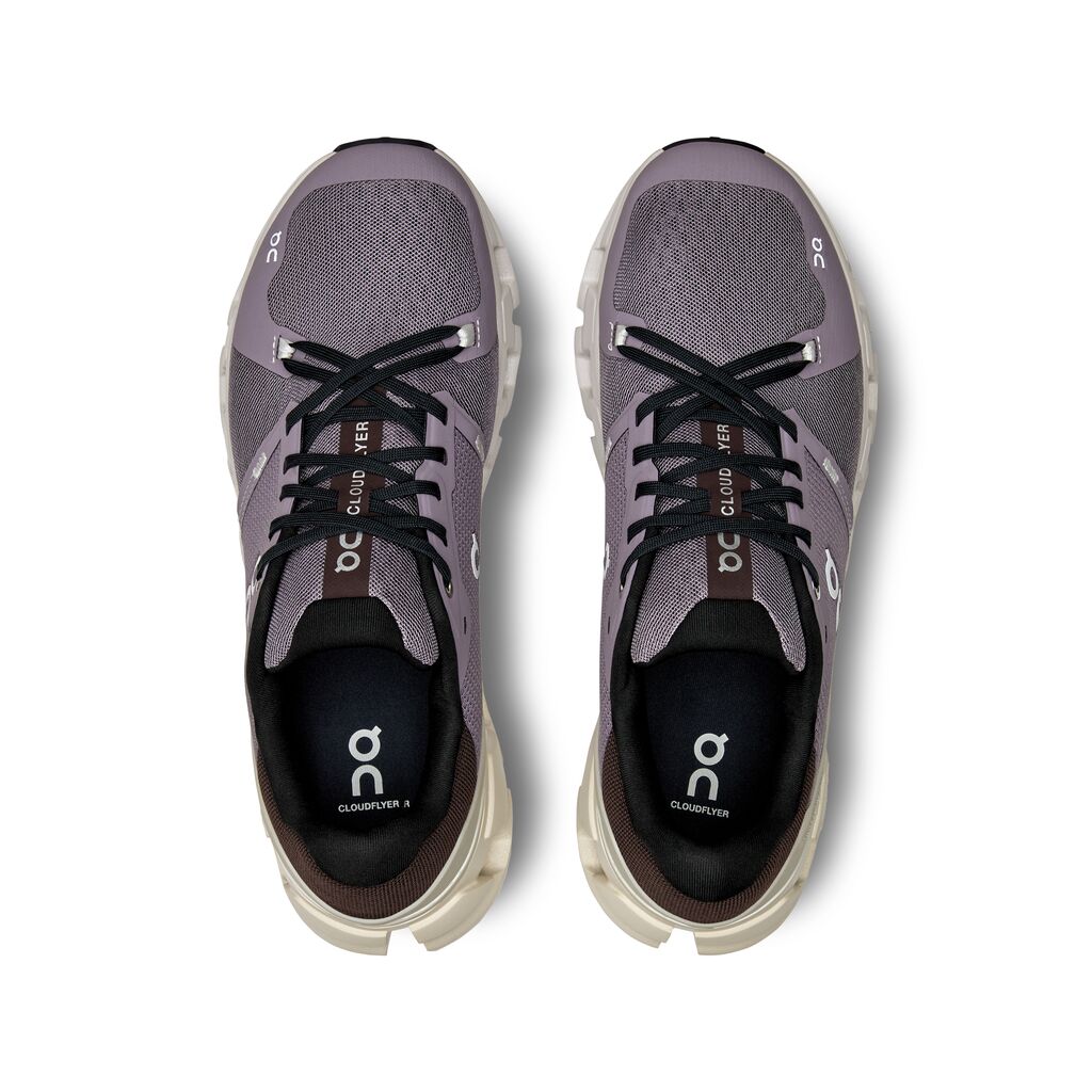 The On Cloudflyer 4 has a diagonal lacing design to secure the foot