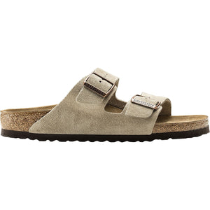 Beige sandal with cork sole on a white background