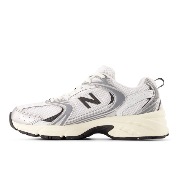 White and gray sneaker with New Balance logo on a white background