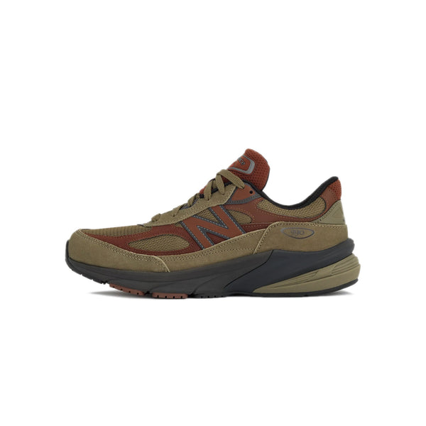 Brown and black shoe on a white background