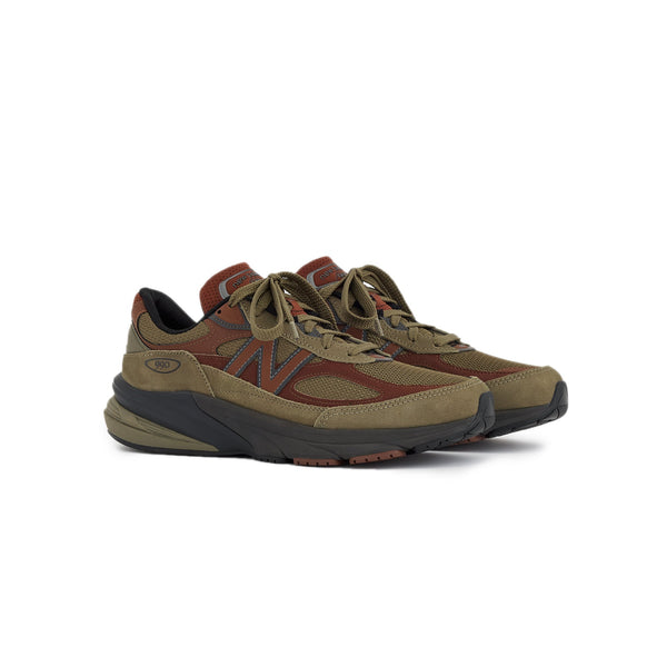 Brown and black shoe on a white background