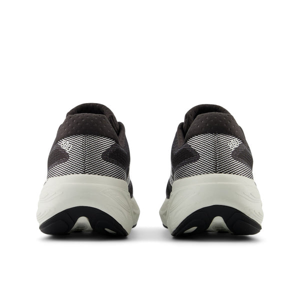 Black and white athletic shoes on a white background