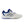 A women's tennis shoe with a white base color and blue accents, featuring the New Balance logo on the side.