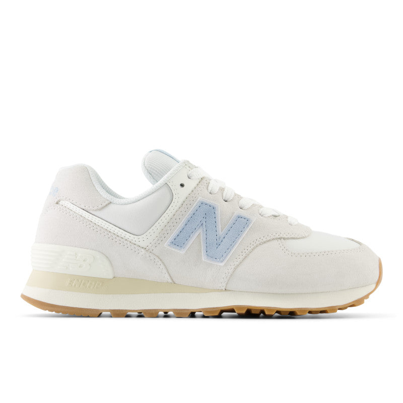 This Women's 574 has a very lighyt Beige color with a light blue "N" logo on teh lateral side
